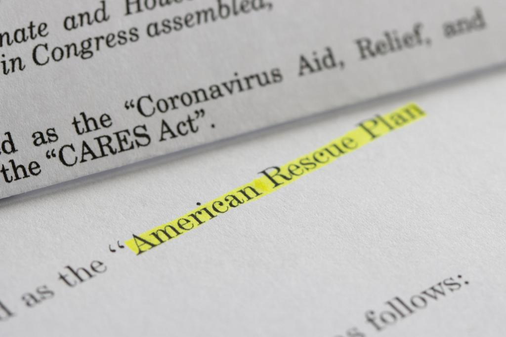 American Rescue Plan words printed and highlighted on paper