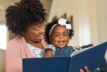 Mom and child reading a book