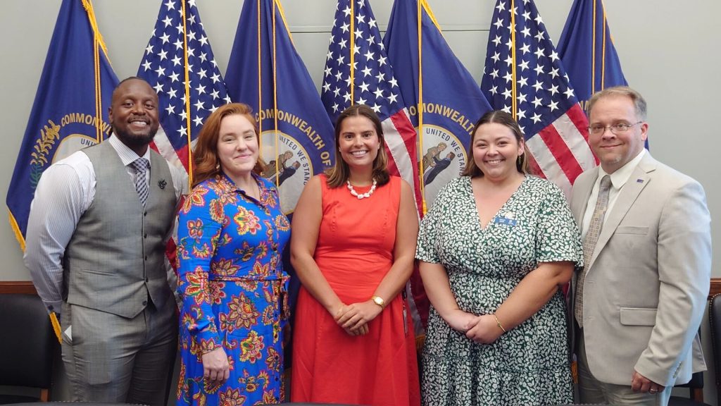 Various United Way staff with a Rand Paul's staff.