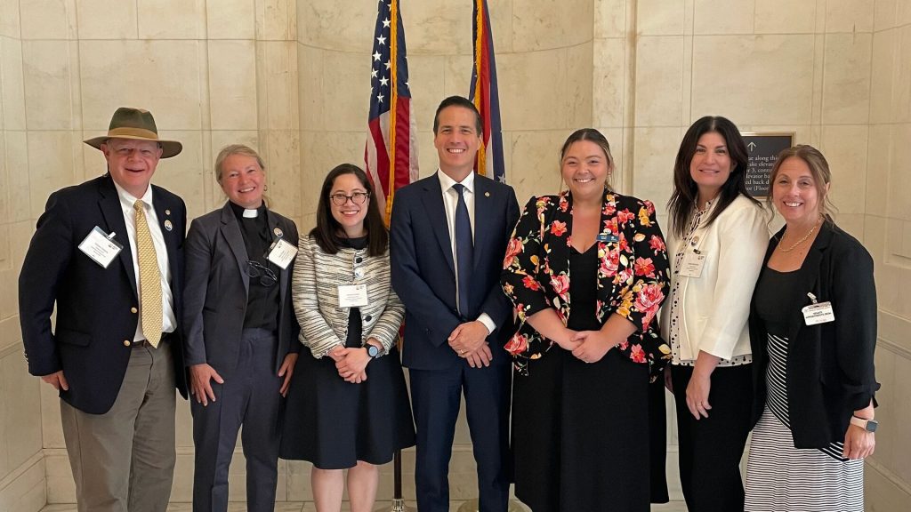 Various United Way staff with Bernie Moreno